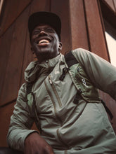 Załaduj obraz do przeglądarki galerii, Kurtka rowerowa POC MOTION Wind Jacket - Epid. Green