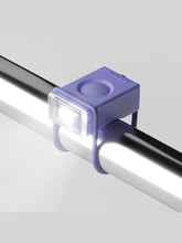 Załaduj obraz do przeglądarki galerii, Lampka rowerowa BOOKMAN Block Light Front 50lm lawendowy