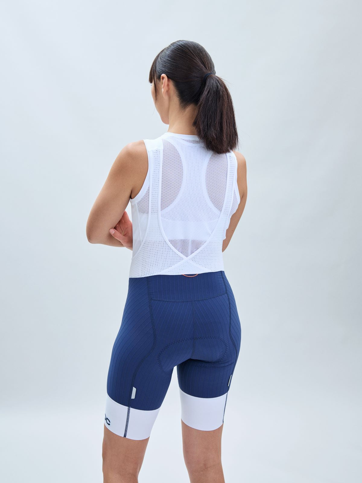 Spodenki rowerowe POC W's Raceday Bibshorts - Turmaline Navy/Hydr. White